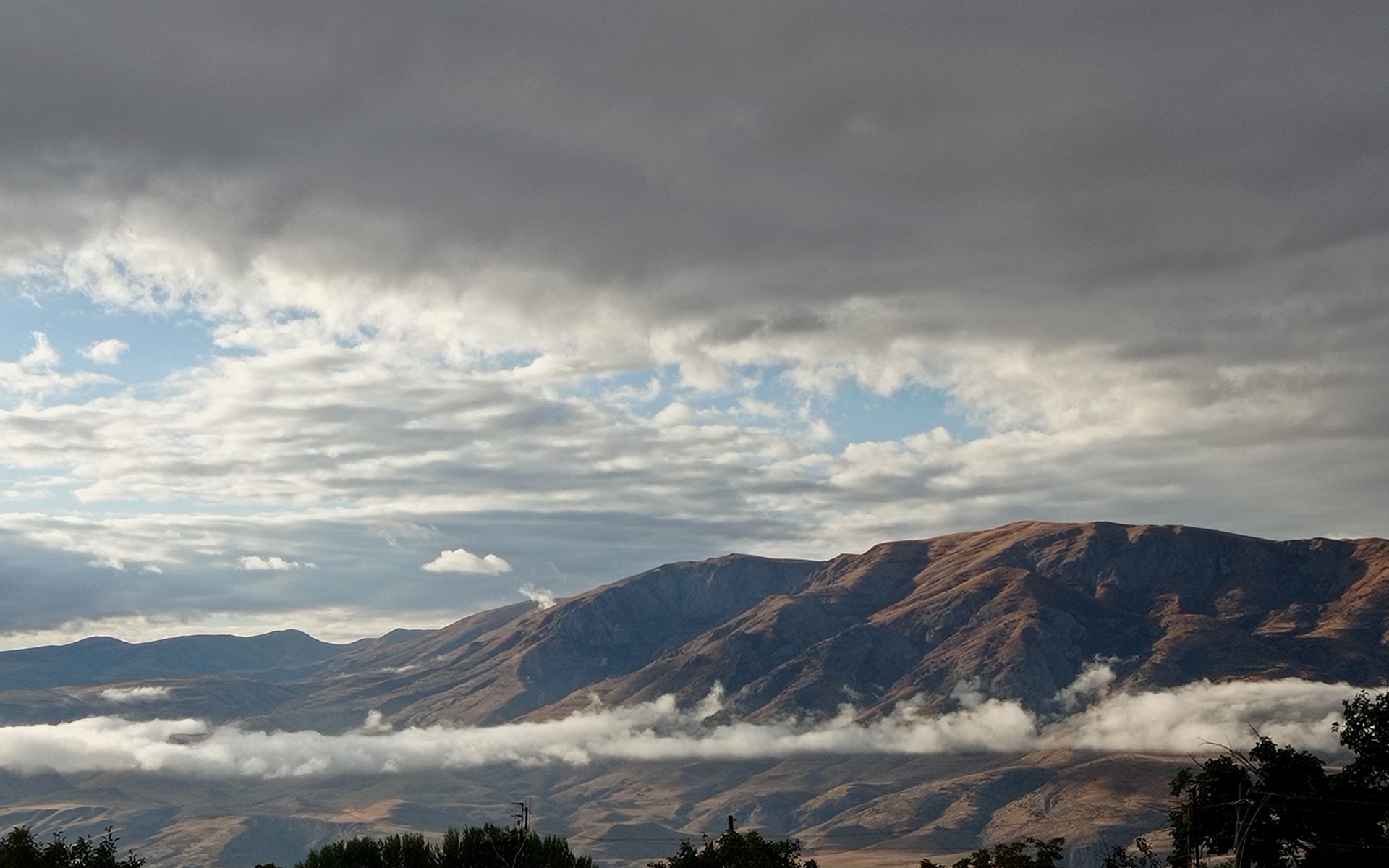 Misty mountains over the Vayots Dzor valley at dawn
